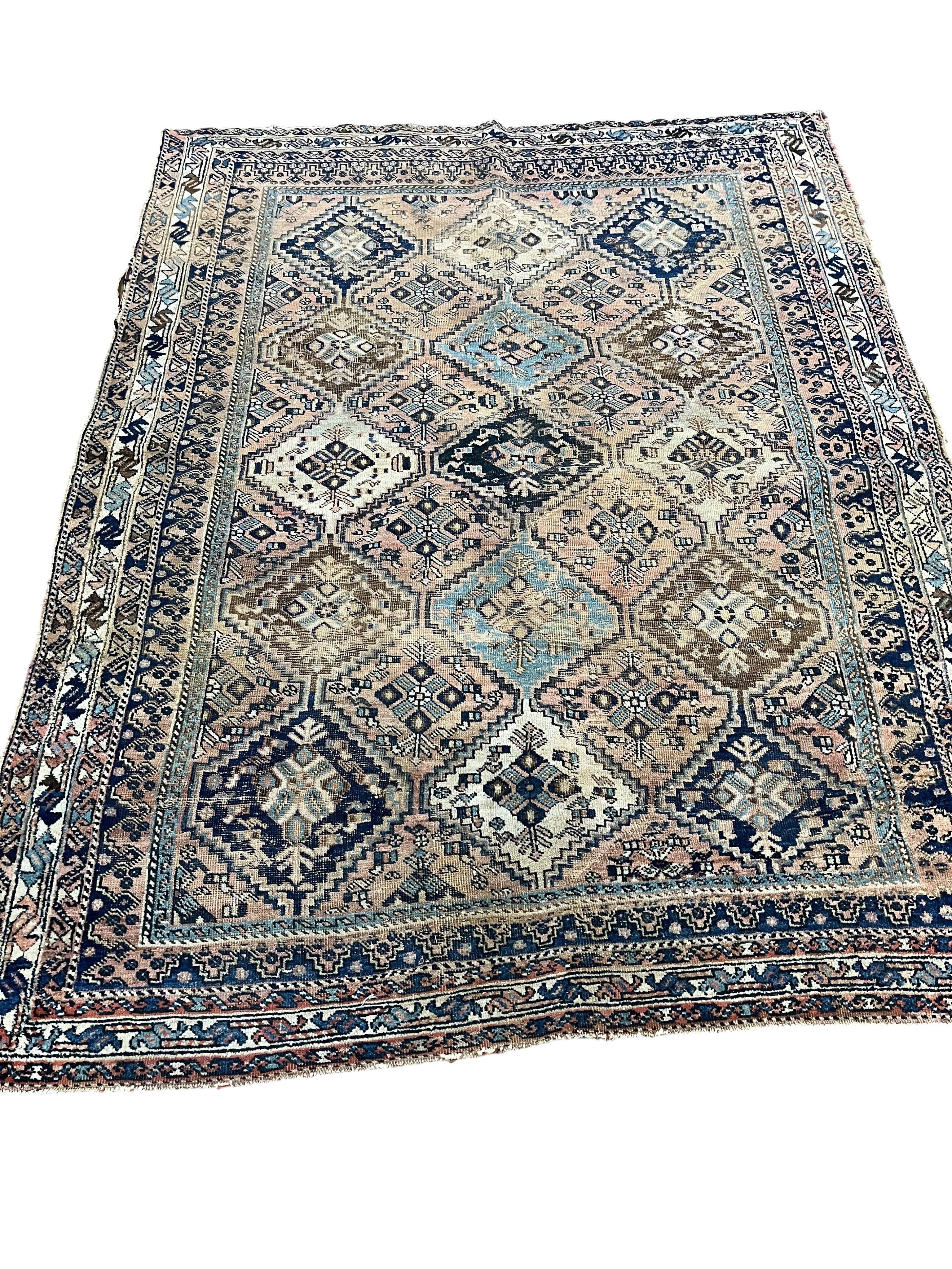 A Caucasian peach ground rug, 190 x 148cm